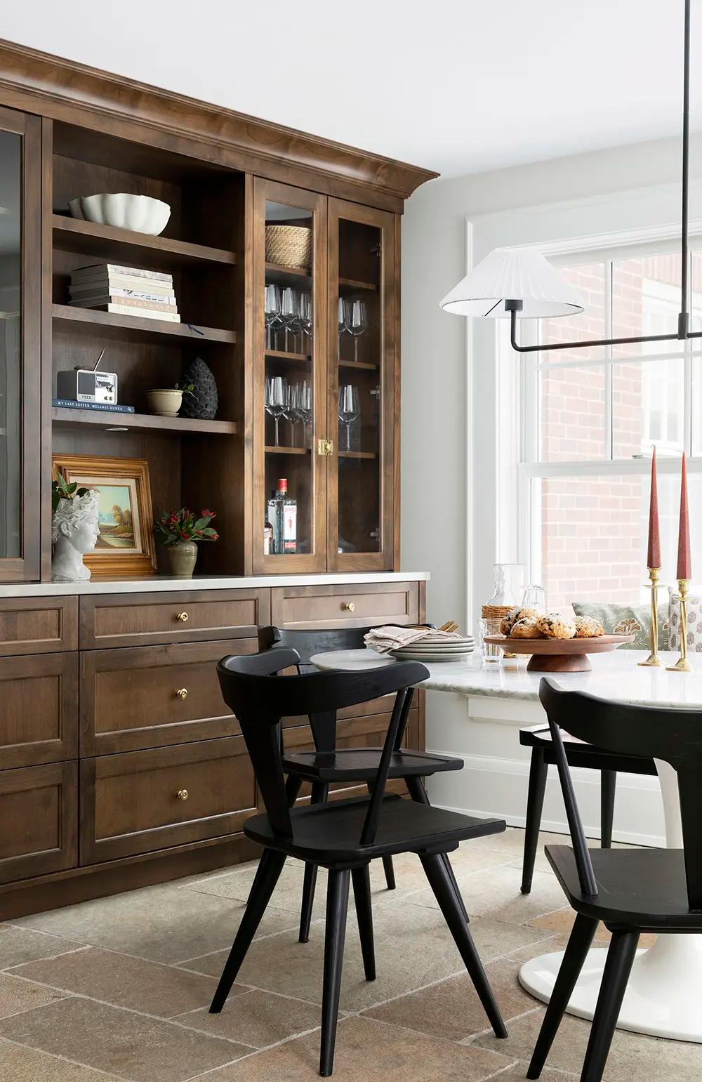 Warm built-in cabinetry and dining nook